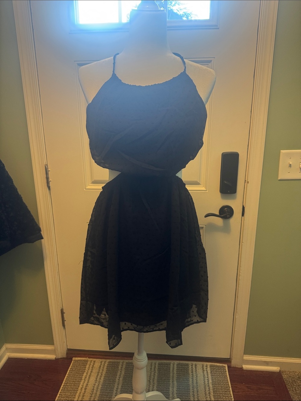 Chic Black Halter Mini Dress with Flowy Skirt